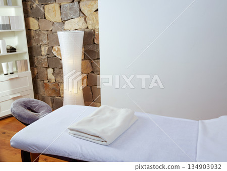 Massage room with massage table 134903932