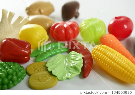 Plastic game, fake varied vegetables and fruits 134903950