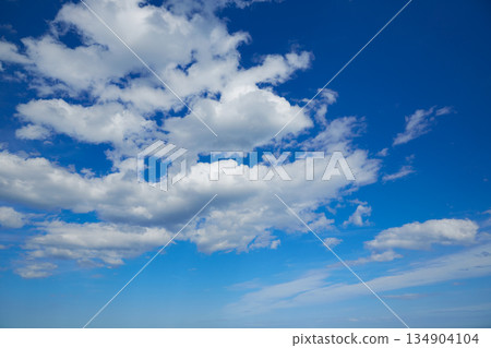 Blue summer sky with white clouds Blue summer sky with white clouds 134904104