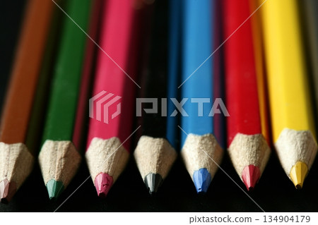 Colorful set of pen in vibrant colors over black Colorful set of pen in vibrant colors over black 134904179