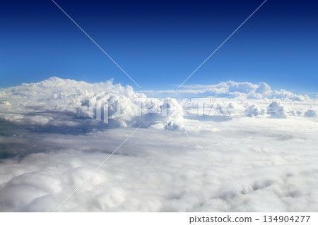 blue sky high view from airplane clouds 134904277