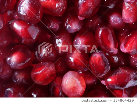 Grenade grain macro detail in vivid red Grenade grain macro detail in vivid red 134904429