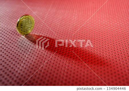 One euro coin currency over hole silver pattern One euro coin currency over hole silver pattern 134904446