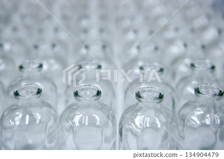 Glass transparent empty bottles assembly line Glass transparent empty bottles assembly line 134904479