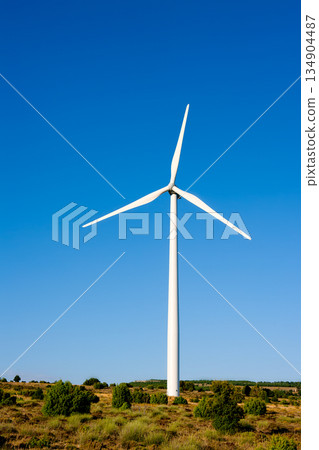 aerogenerator windmill in sunny blue sky 134904487