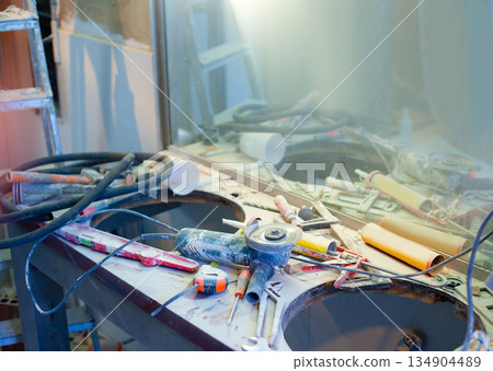 home improvement  messy clutter with dusted tools 134904489
