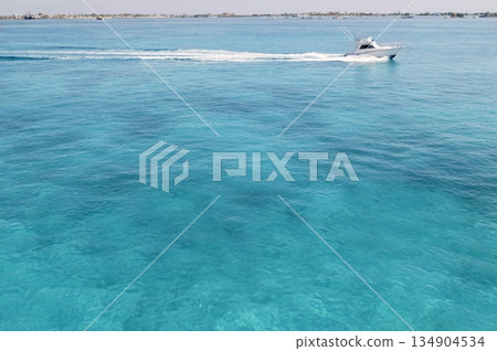 Blue turquioise Caribbean sea fishing boat 134904534