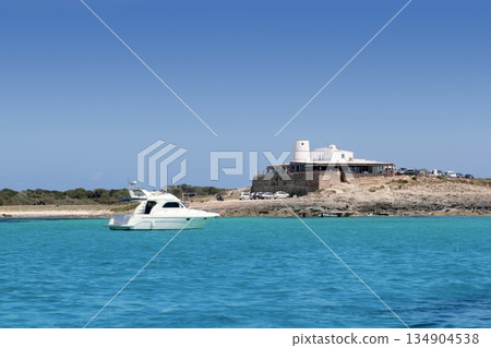 Illetes salt windmill from sea view Formentera 134904538