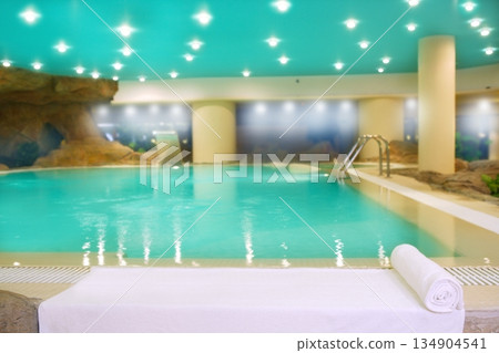 spa indoor turquoise water white towel spa indoor turquoise water white towel 134904541