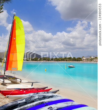 Beach of Puerto de Alcudia in Mallorca with hobie cat Beach of Puerto de Alcudia in Mallorca with hobie cat 134904553