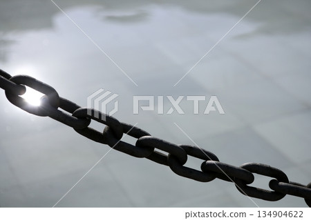 Chain outdoor with water tiles and reflexion Chain outdoor with water tiles and reflexion 134904622