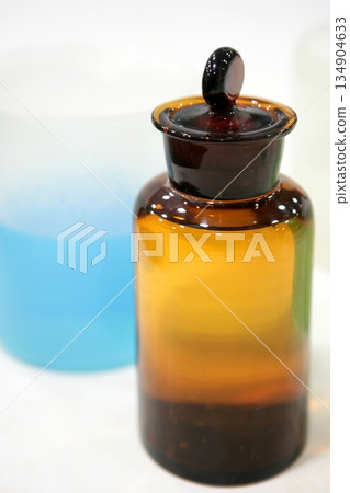 Laboratory stuff, glass cylinder, colorful liquids 134904633