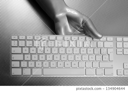 Futuristic silver gray hand and keyboard 134904644