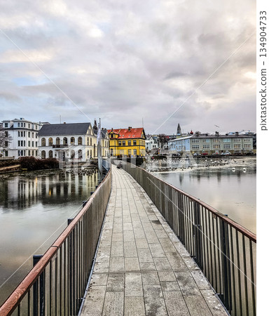 Pedestrian Bridge Over Tjornin Lake in Reykjavik, Iceland Pedestrian Bridge Over Tjornin Lake in Reykjavik, Iceland 134904733