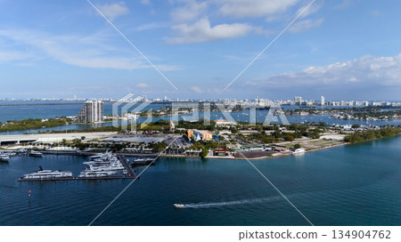 Aerial drone view of Miami bay with islands and boats on calm water Aerial drone view of Miami bay with islands and boats on calm water 134904762