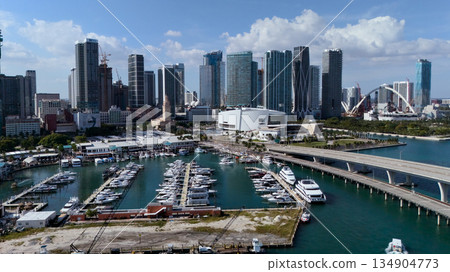 Aerial drone view of Miami downtown marina with yachts and skyline 134904773