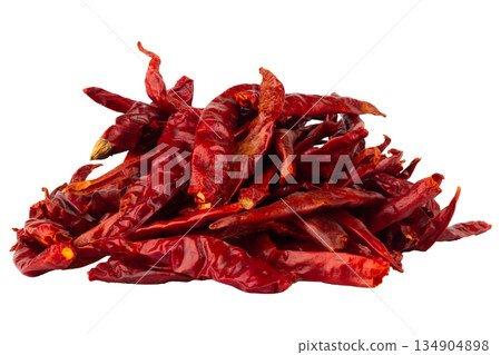 Roasted chilies are piled up on a white background Roasted chilies are piled up on a white background 134904898