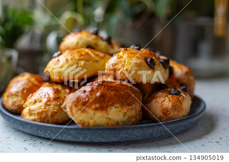 Freshly baked golden cranberry scones 134905019
