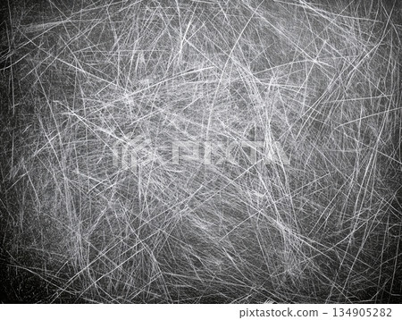 黑板風格的紋理背景，上面有無數交叉的白色線條 134905282