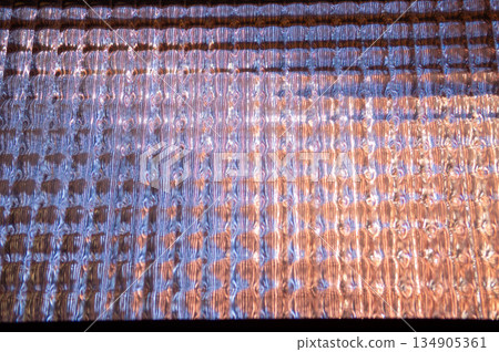 view of the reflections of the rough glass of the entrance of the house view of the reflections of the rough glass of the entrance of the house 134905361