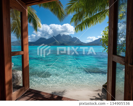 從熱帶度假村的水上別墅可以欣賞到蔚藍的海洋和壯麗的山景 134905536
