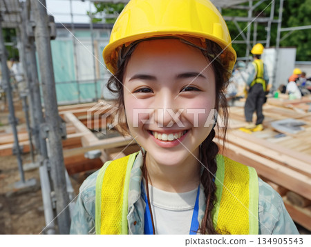 Smiling female worker at a construction site 134905543