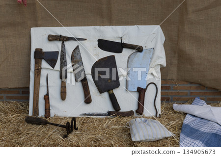 tools used in butchery for slicing and cutting meat products 134905673