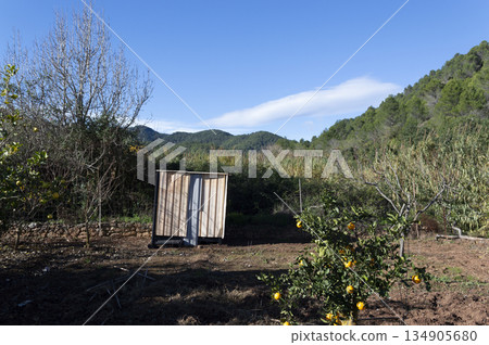 shed constructed of sheet metal and aluminum for storage of farm implements 134905680