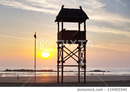 wooden sighting turret and sea rescue on the ocean wooden sighting turret and sea rescue on the ocean 134905940