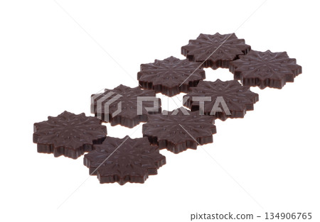 Chocolate snowflakes isolated 134906765