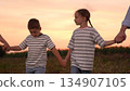 mother father children boy girl park sunset, man woman toddlers outdoors, Sure Here are 10 options for image titles in English, separated by commas: 134907105