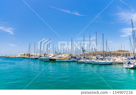 Yachts and boats in marina harbor of Port of Alicante Puerto de Alicante seaport 134907216