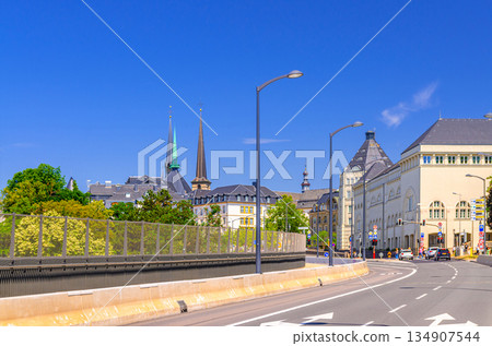 Road leading to Ville Haute quarter with Palace of Justice buildings of Judiciary City Cite judiciaire and churches spires in Luxembourg City historical centre 134907544