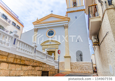 Esglesia de Sant Jaume i Santa Anna, San Jaume catholic church in El Castell Old town Benidorm city historic centre in summer day, Valencian Community, Spain Esglesia de Sant Jaume i Santa Anna, San Jaume catholic church in El Castell Old town Benidorm city historic centre in summer day, Valencian Community, Spain 134907556