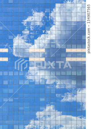 South Tower skyscraper modernism architecture style, modern high-rise office building, abstract details of facade glass curtain wall cells reflecting white clouds in blue sky, Brussels city, Belgium 134907565