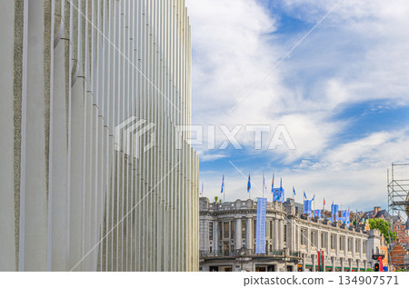 Street view in Brussels city historical center with Centre for Fine Arts Palais des Beaux-Arts BOZAR art building and structure wall of Montagne du Parc Contemporary office BNP Paribas Fortis bank Street view in Brussels city historical center with Centre for Fine Arts Palais des Beaux-Arts BOZAR art building and structure wall of Montagne du Parc Contemporary office BNP Paribas Fortis bank 134907571
