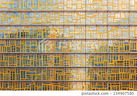 Europa building wall, modernism architecture style, modern high-rise office building, abstract details of facade wall, patterned cells, Brussels city, Belgium Europa building wall, modernism architecture style, modern high-rise office building, abstract details of facade wall, patterned cells, Brussels city, Belgium 134907580