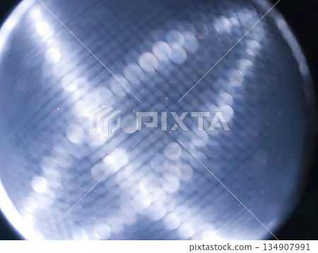 Abstract background in space theme with blurred white bokeh highlights. Modern design. 134907991