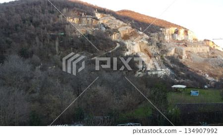 mountains with marble quarries in Botticino in northern Italy 134907992