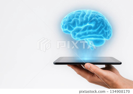 A blue digital brain above a tablet. Space for text. 134908170