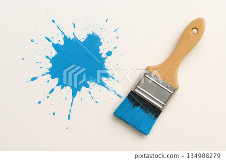 Blue paint and a brush on a light theme. 134908279