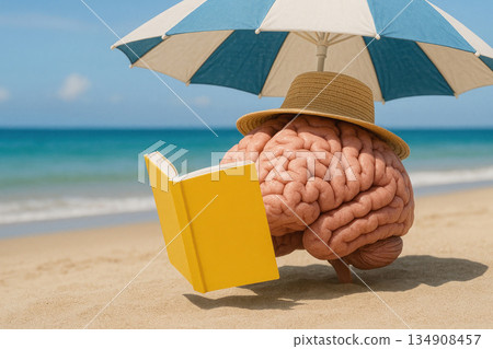 Brain in hat reading a book on the beach under an umbrella. 134908457