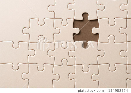 A puzzle with the missing piece. Space for text. 134908554
