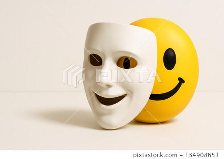 The mask hides a smiling emoji. Space for text. 134908651