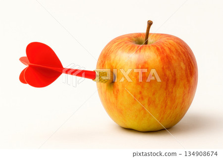 The apple is pierced with a dart. The apple is pierced with a dart. 134908674