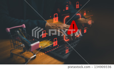 Cybersecurity warning concept with hacker using laptop and credit card, symbolizing online fraud, data theft, phishing, and e-commerce payment security risks in digital financial transactions. Cybersecurity warning concept with hacker using laptop and credit card, symbolizing online fraud, data theft, phishing, and e-commerce payment security risks in digital financial transactions. 134909336