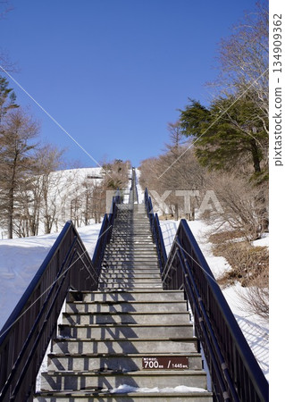 Snow piled stairs Snow piled stairs 134909362