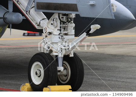 Carrier-based aircraft nose gear: The nose gear of a carrier-based aircraft equipped with an aircraft launch bar Carrier-based aircraft nose gear: The nose gear of a carrier-based aircraft equipped with an aircraft launch bar 134909496