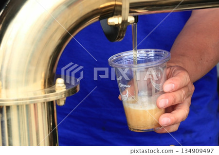 Beer poured from the tap, craft beer, draft beer Beer poured from the tap, craft beer, draft beer 134909497