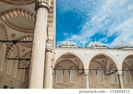 Arabic Minaret Exterior Showing Intricate Carvings at Sunrise Arabic Minaret Exterior Showing Intricate Carvings at Sunrise 134909551
